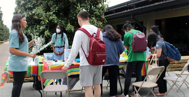 A collection of students participating in the Earth Fair.